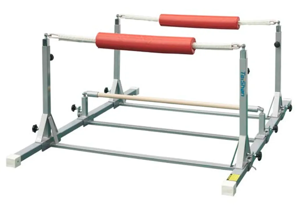 Kids rebounder frame with metal base, two rope rails with red foam pads, a wooden lower bar, and Taishan printed on an upright.