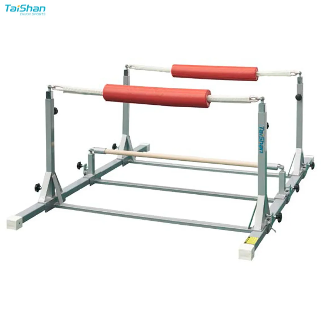Adjustable kids rebounder frame with two red foam-covered upper ropes and a low wooden practice bar on a silver metal base.