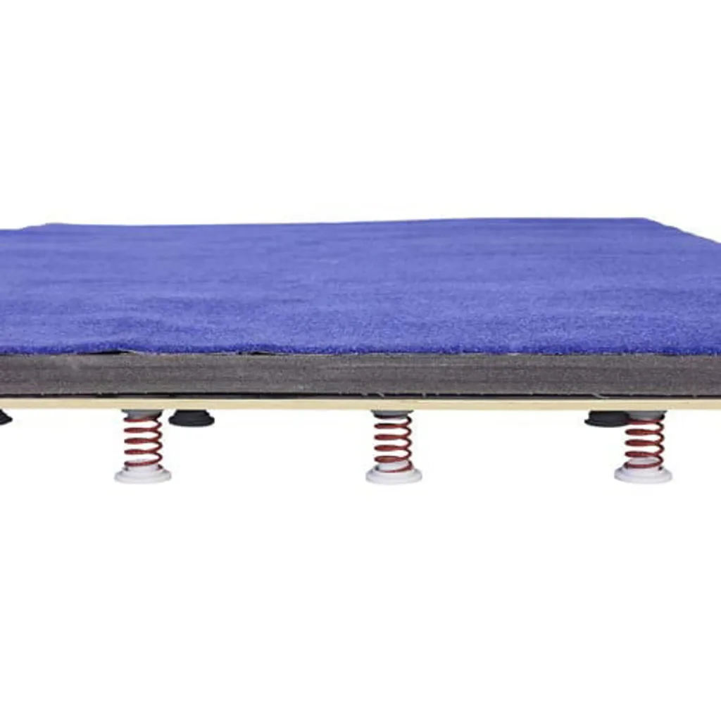 Tumbling board with XPE foam surface and layered edges, supported by multiple coil springs visible underneath.
