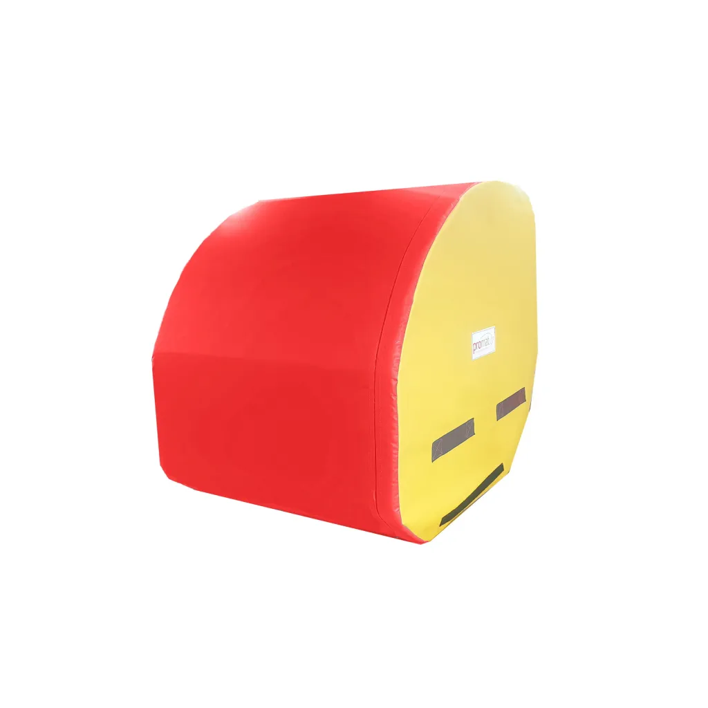 Red curved top tumbler with yellow end panel, high-density PU foam core, flame-retardant PVC cover, and black carry handles.