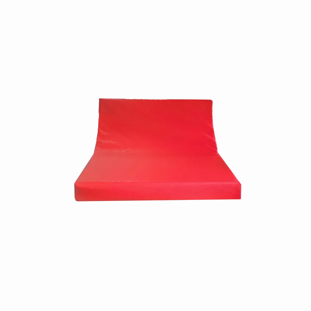 Inclined tumbling top with flat base, made from high-density PU foam with heavy-duty flame-retardant PVC cover and carry handles.
