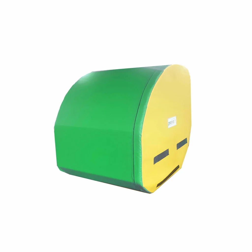 Green top tumbler with a yellow rounded end, black carry handles and flame-retardant PVC cover over high-density PU foam for gymnastics.