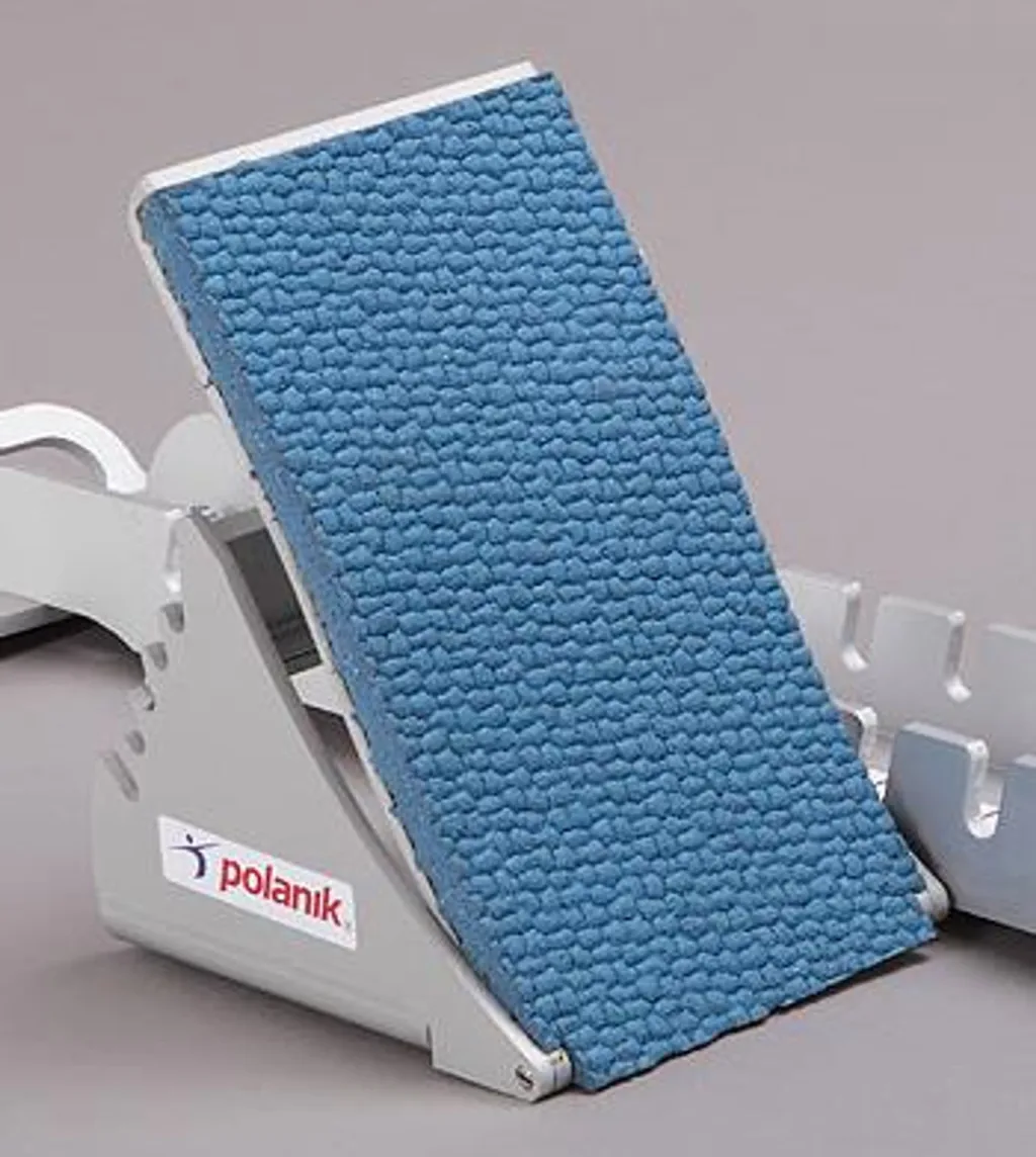 Aluminium competition starting block with a blue textured synthetic footplate mounted on an angled gray base.