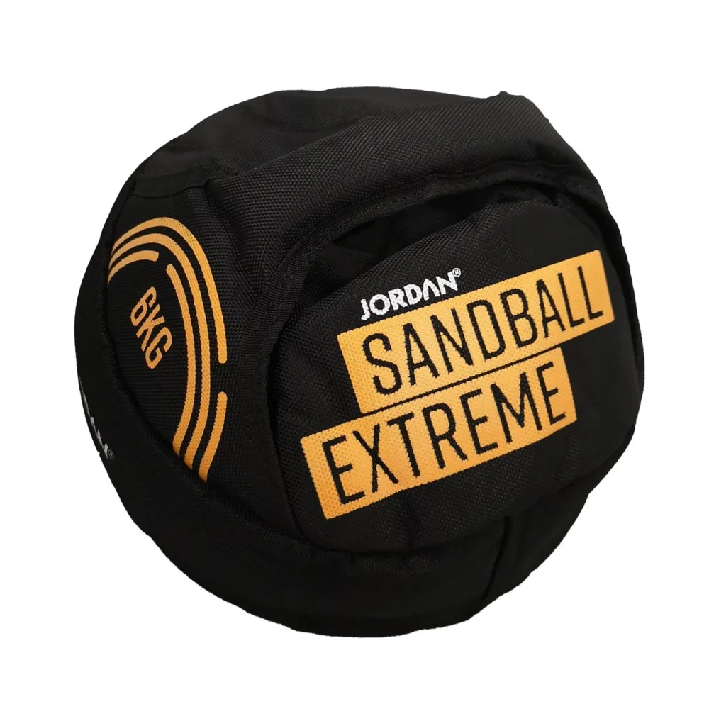 Black sandball with orange Sandball Extreme label and 6kg side marking, featuring two handles.