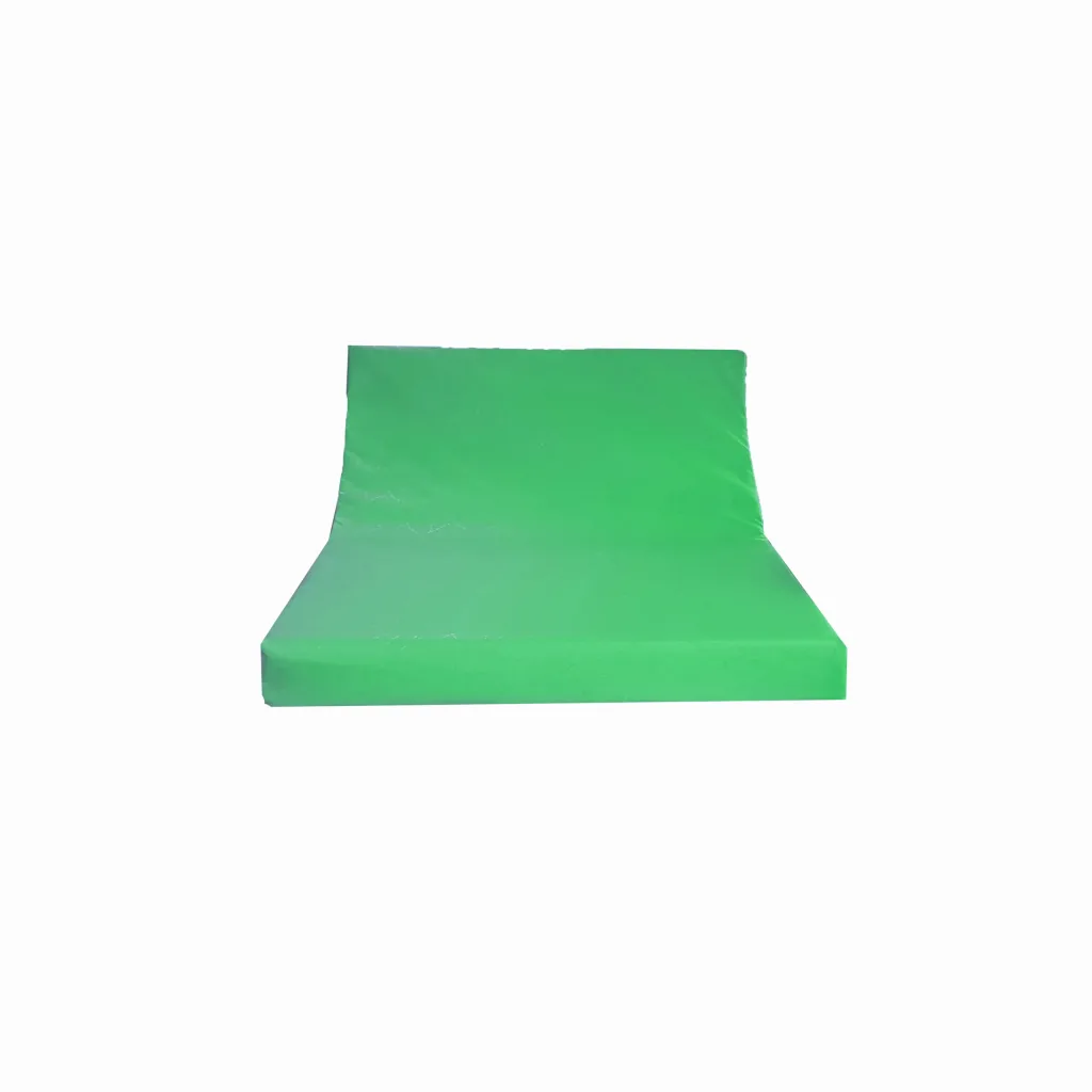Green top tumbler with angled back and flat base, covered in heavy-duty flame-retardant PVC over high-density PU foam.