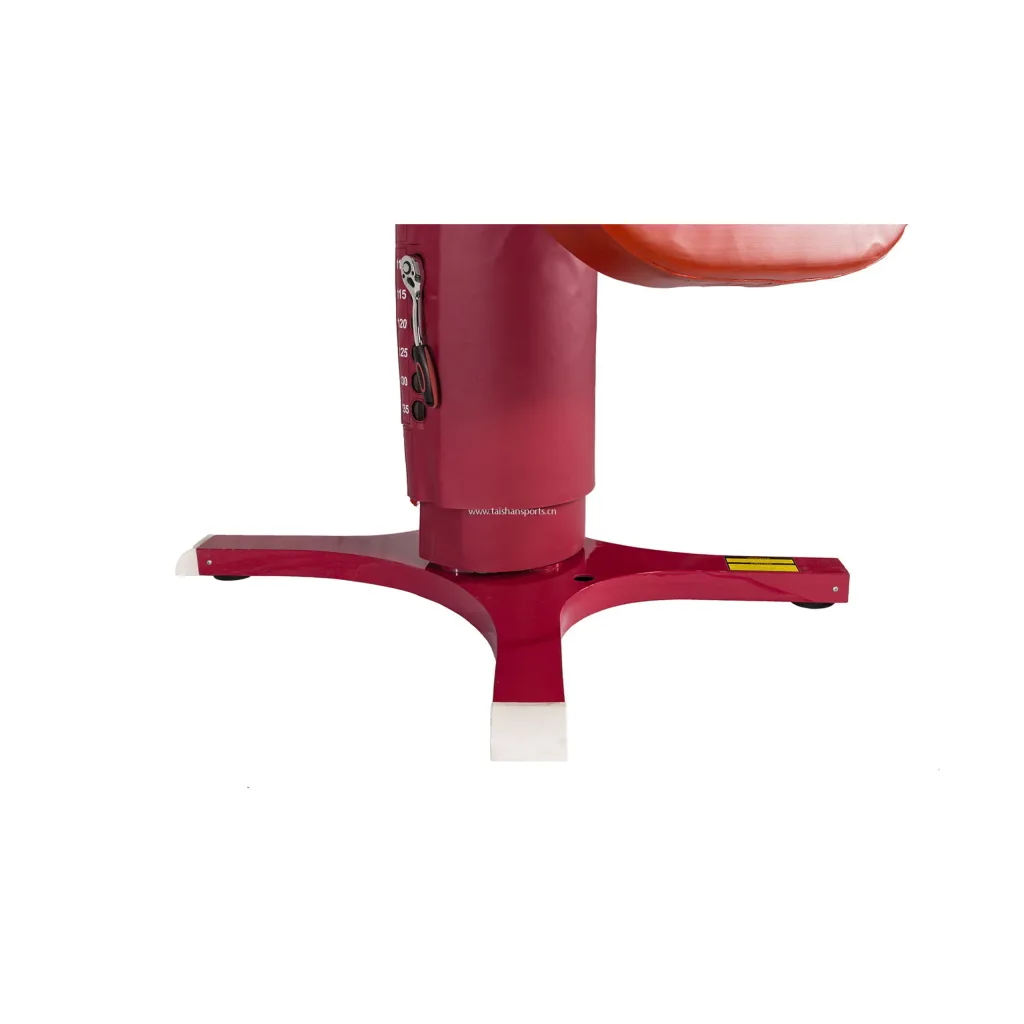 Red competition vaulting table central column and three-arm base with white end caps, www.taishansports.cn visible on the column.