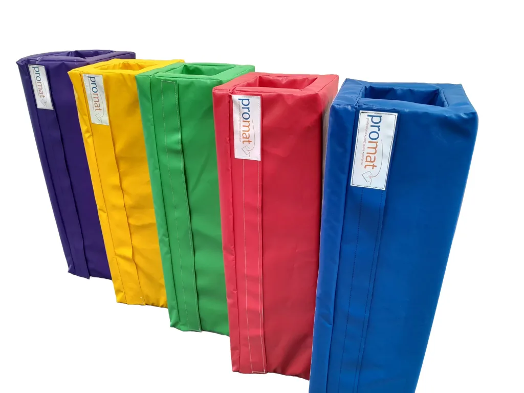 Square post pads in purple, yellow, green, red and blue with heavy-duty PVC covers and polyurethane foam, label reading promat.