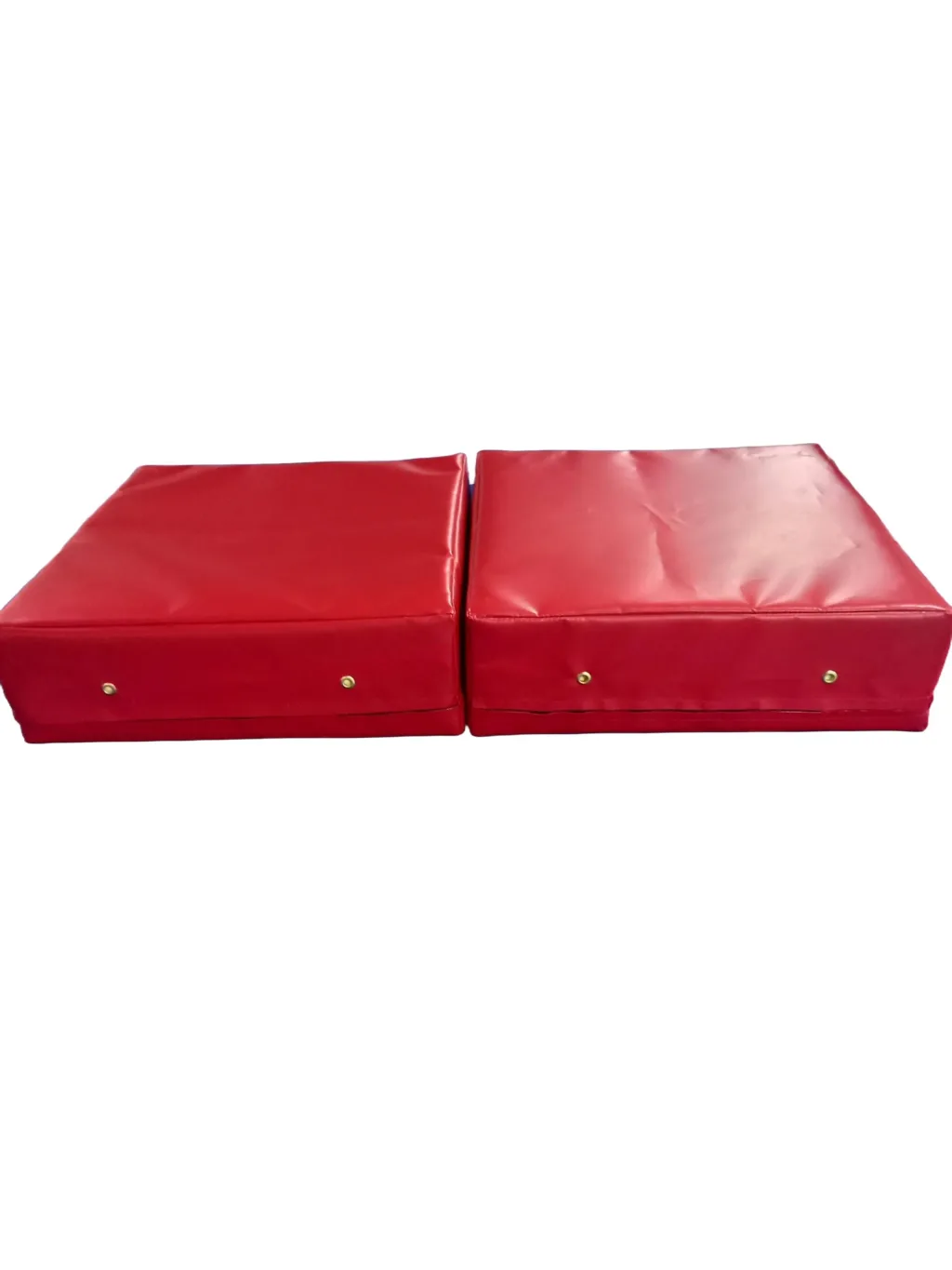 Two weightlifting drop pads with heavy-duty fire retardant PVC covers placed side by side, each with metal eyelets.