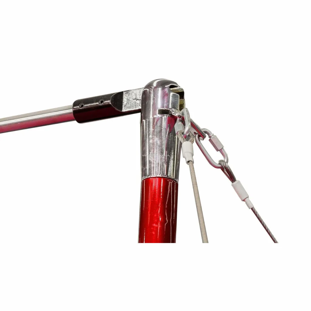 Red upright high bar post with chrome top fitting, connecting a silver horizontal bar and stainless-steel tension cables with carabiners.