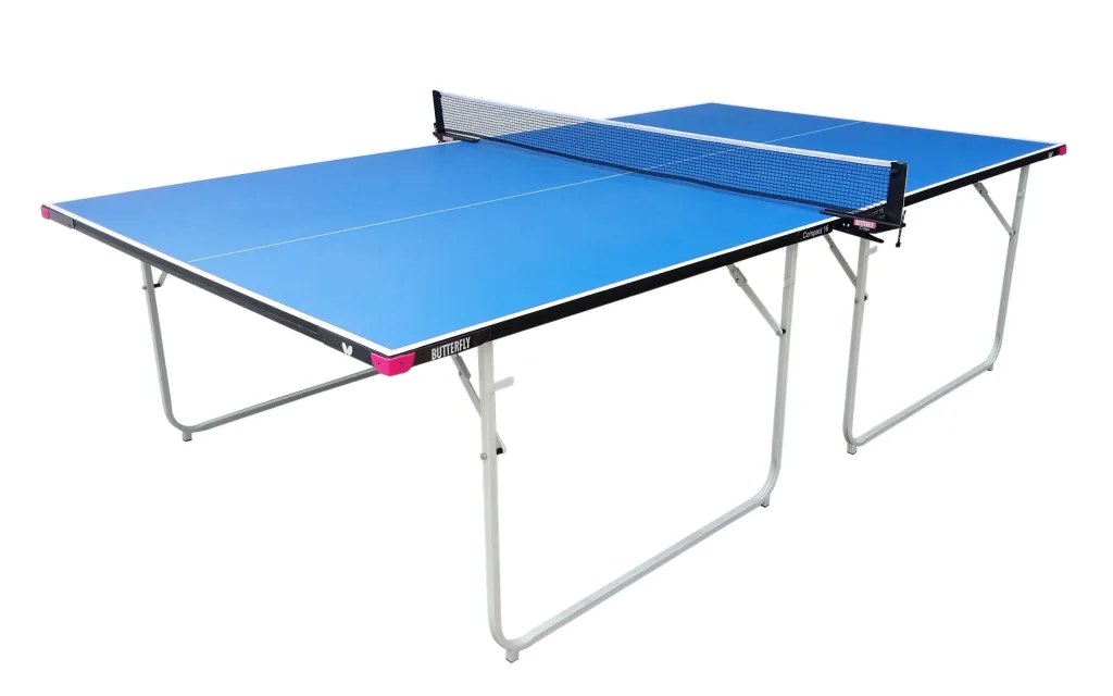 Blue table tennis table with magenta corner protectors, black net and folding light silver legs.