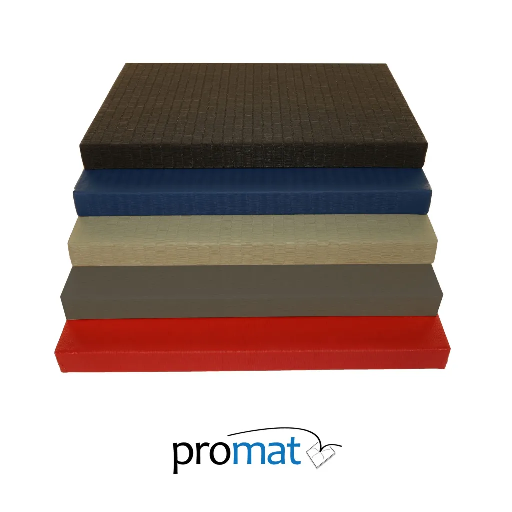 Stack of judo mats in black, blue, green and red with tatami PVC surface and "promat" printed below.