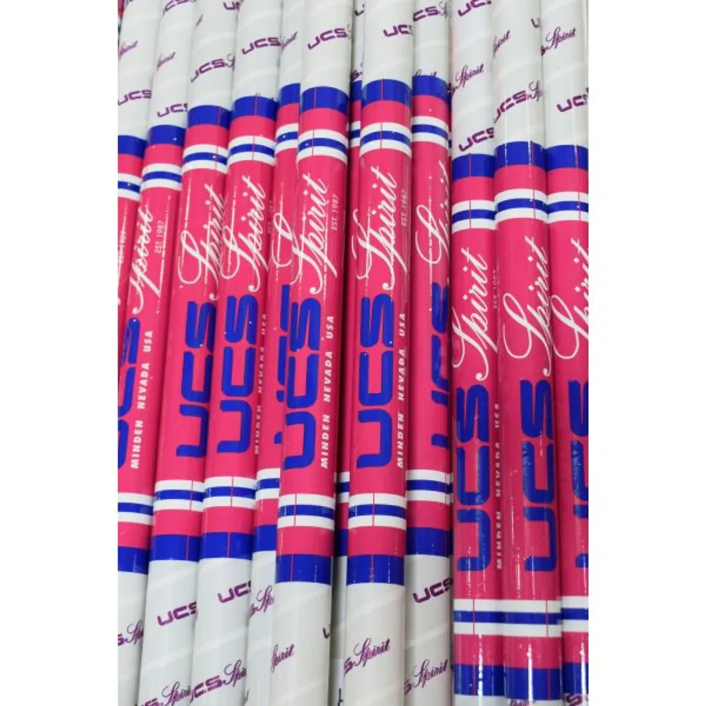 Multiple pink and white vaulting poles with blue accents labeled UCS and script Spirit, arranged vertically.