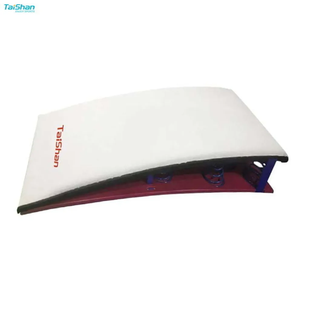 White competition springboard with Taishan printed on top, birch wood base and visible blue coil springs.