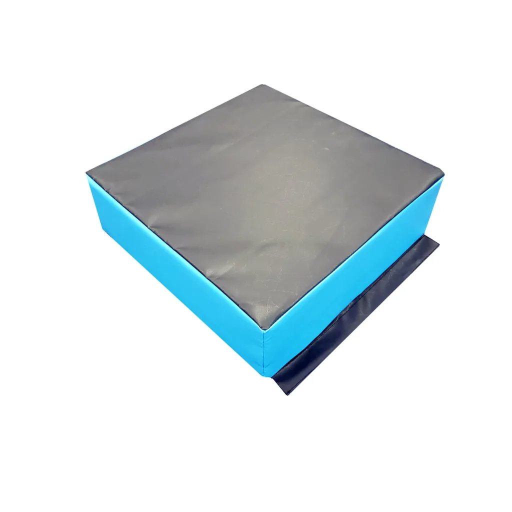 Black-topped blue foam stepping block with a black hook-and-loop connector flap at one side on a white background.