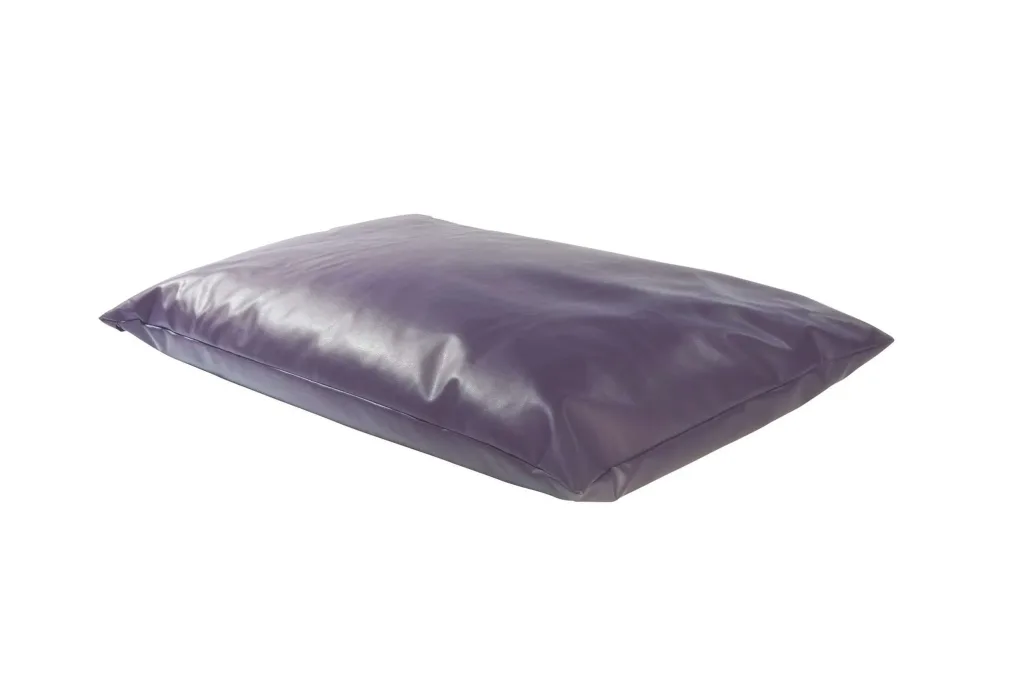 Large rectangular floor cushion in faux leather with a smooth, shiny 100% PVC wipe-clean cover and low profile.