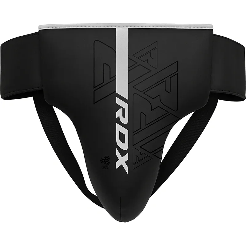Black groin guard with a white vertical stripe and large RDX logo, padded cup and elastic waist and leg straps.