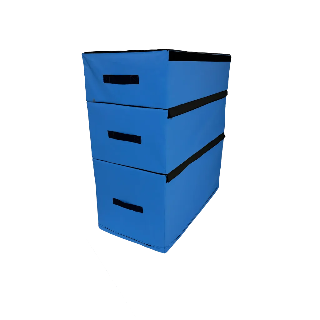 Three stacked blue PVC-covered jumping blocks with black hook-and-loop connectors and black carry handles.