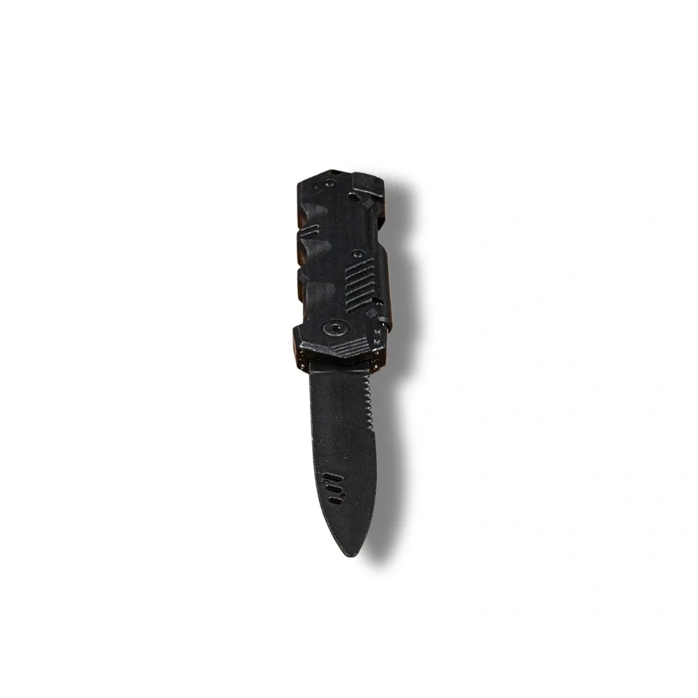Retractable training knife with a textured handle and partially extended serrated blade.