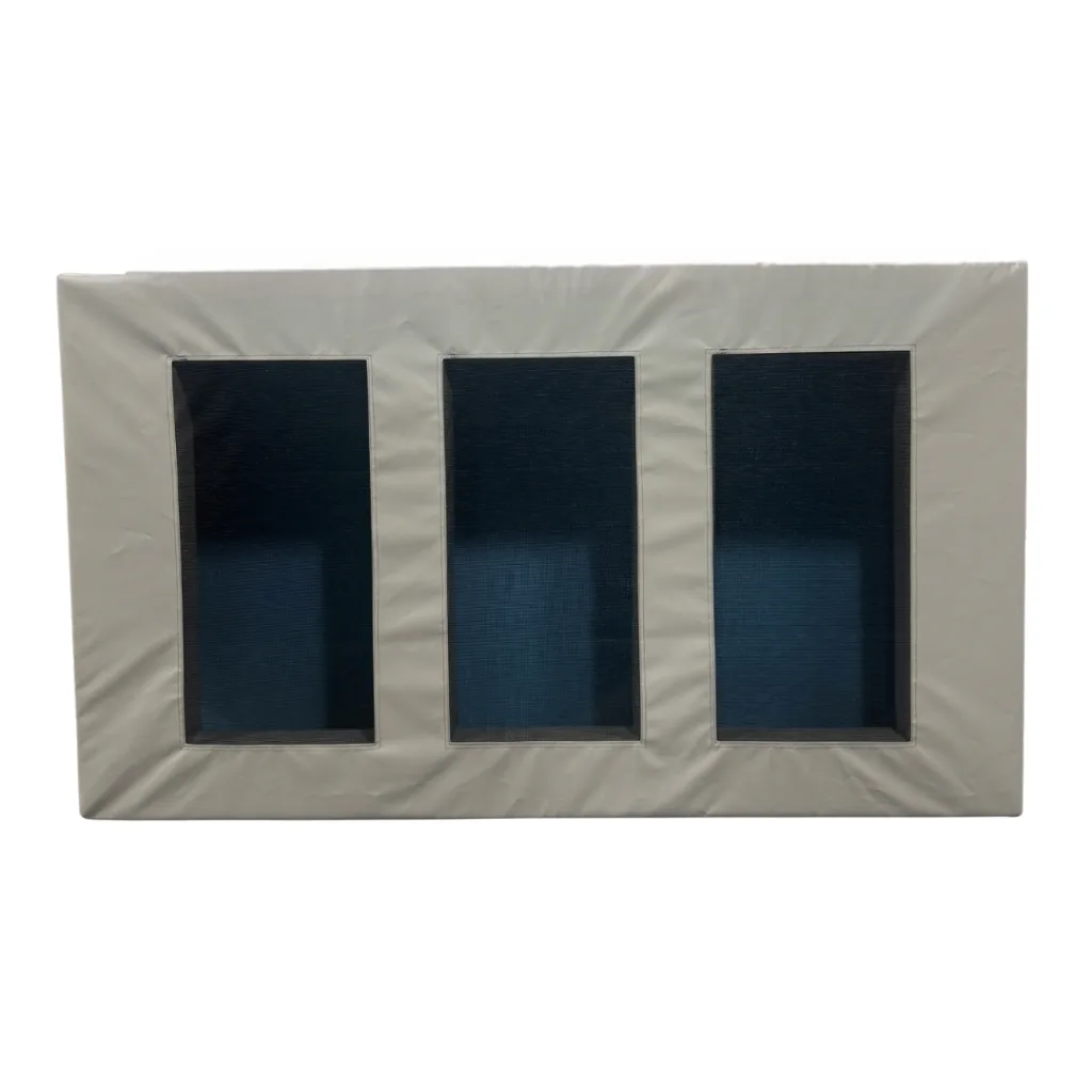 Padded radiator cover with three vertical mesh ventilation panels and wipe-clean outer surface, designed for high-impact safety.