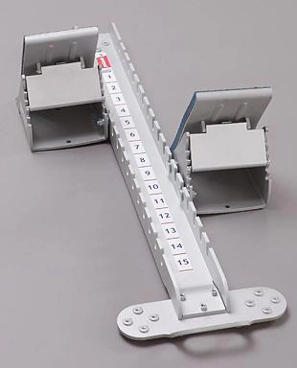 Competition aluminium starting block with two adjustable foot supports on a central bar labeled 1 2 3 4 5 6 7 8 9 10 11 12 13 14 15.