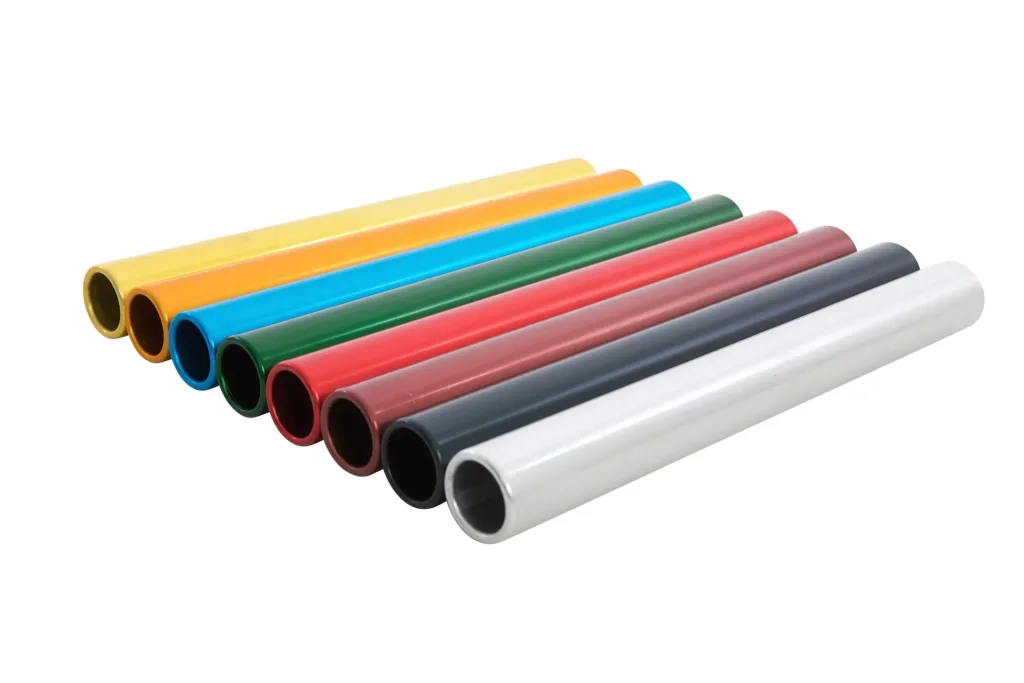 Eight anodized aluminium relay batons in assorted colours with hollow, smooth turned ends.