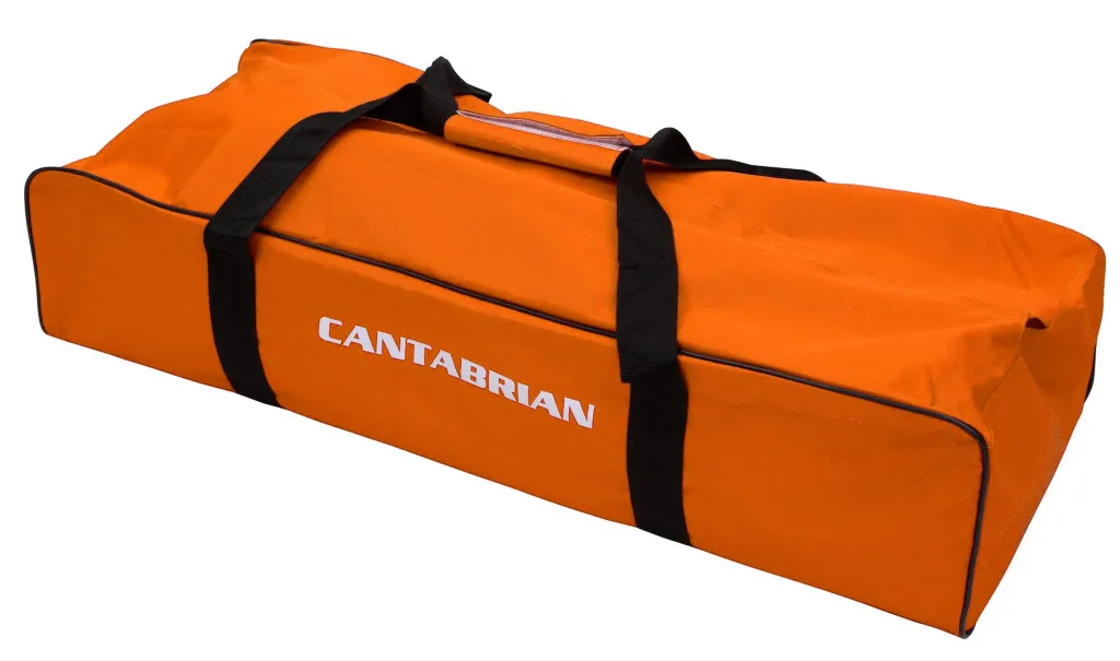 Starting block bag with hard base, top hook and loop fastener, straps to hold centre bar and "Cantabrian" text on the side.