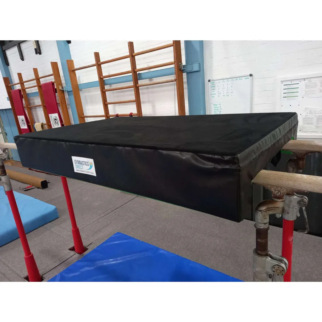 Parallel bars protection mat with jersey top and removable flame-retardant nylon-reinforced PVC zip cover, U-shaped to fit bars with two handles.