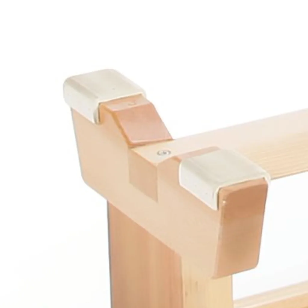 End of a traditional balance bench showing kiln-dried pine leg with white nylon hook and white rubber corner pad.