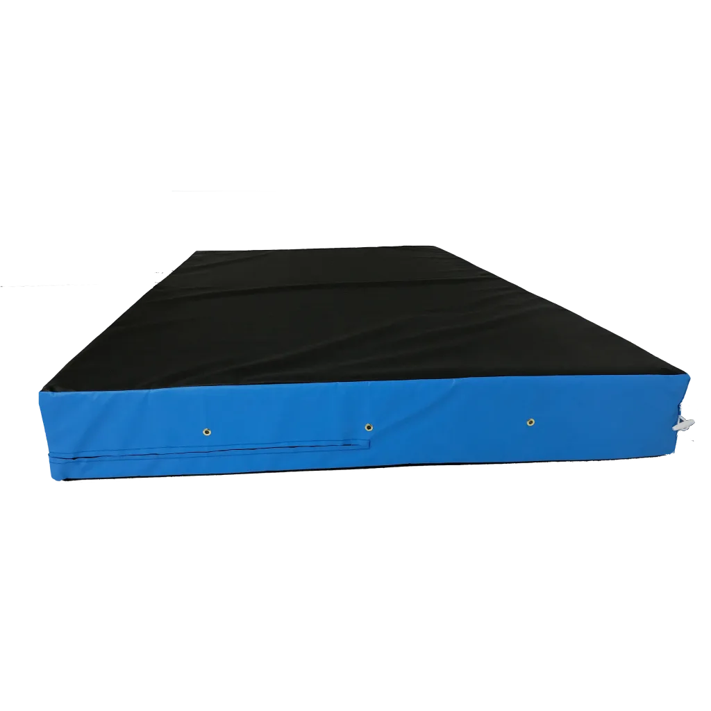 Rectangular landing mat with black top and blue heavy-duty PVC sides, carry handles and brass grommets visible along the front.
