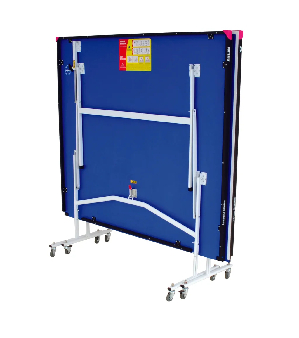 Fitness rollaway table folded upright with blue playing top, light silver steel frame and magenta corner pieces on casters with visible "LOCK" label.