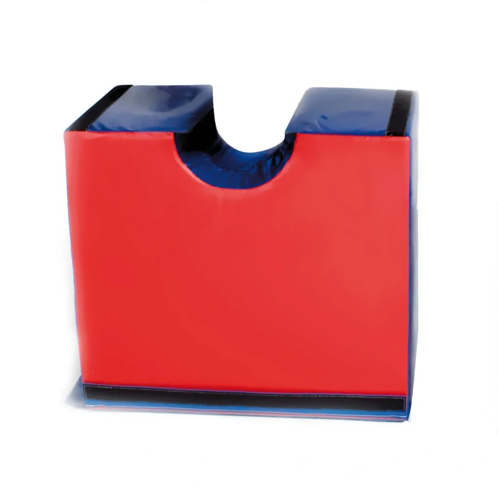Rectangular red foam gymnastics block with a U-shaped blue top notch and black trim.
