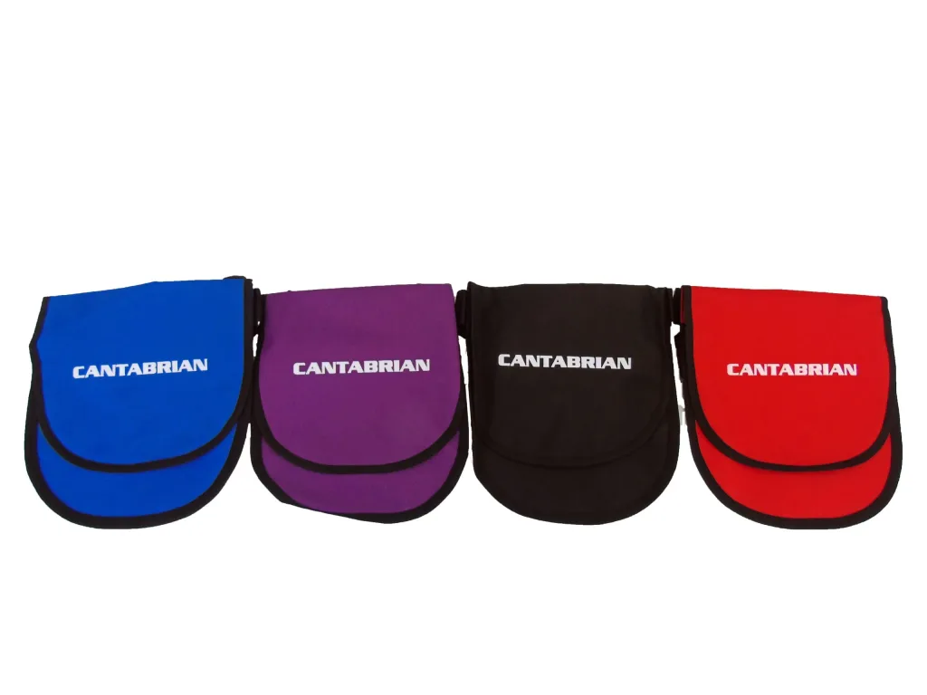 Four fabric discus cases in blue, purple, black and red lined side by side, each labeled CANTABRIAN in white.