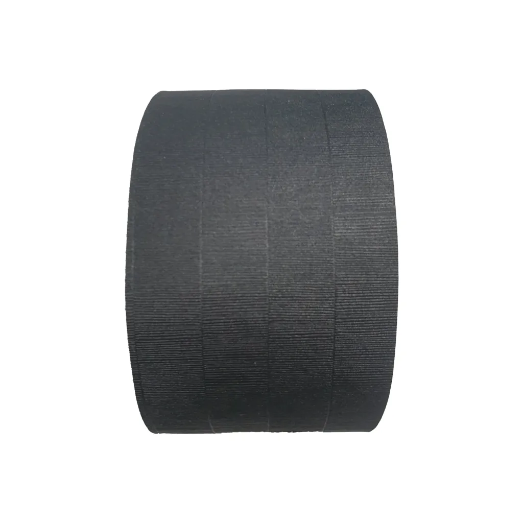 Roll of black textured tatami tape showing ridged surface and faint vertical seams on a white background.
