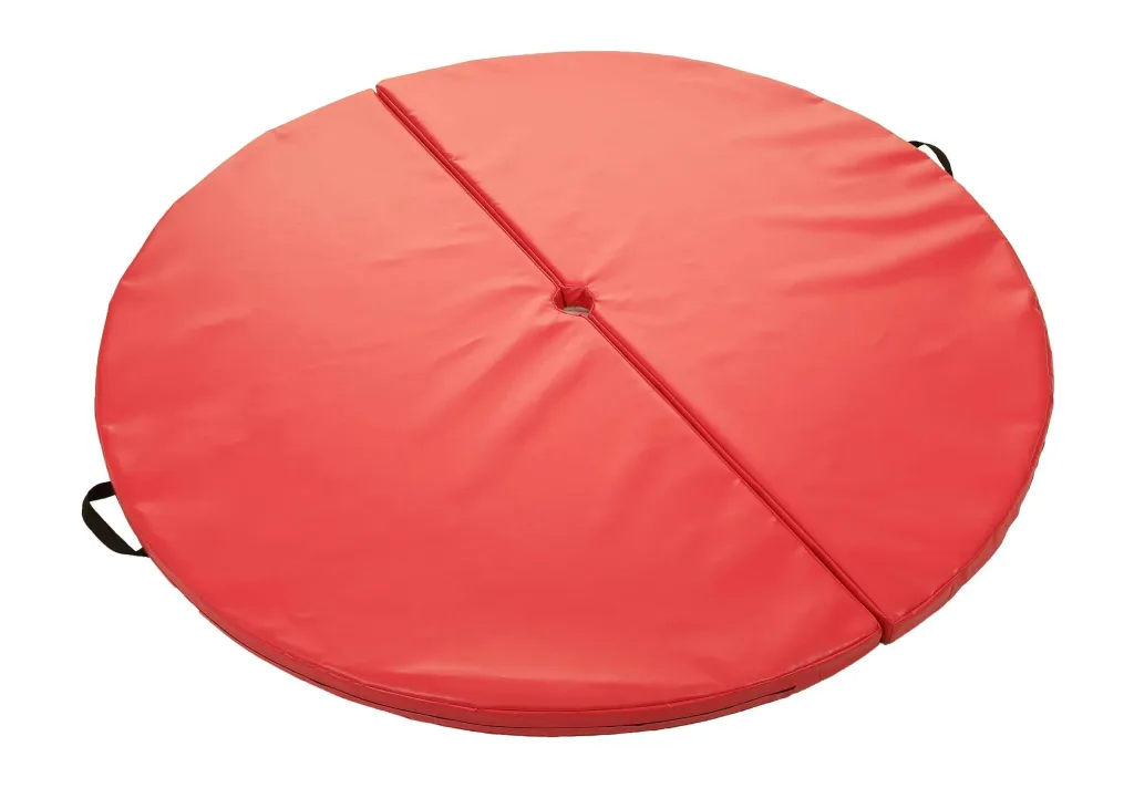 Two-piece circular heavy-duty PVC pole mat with a center hole, visible seam and fixed carry handles.