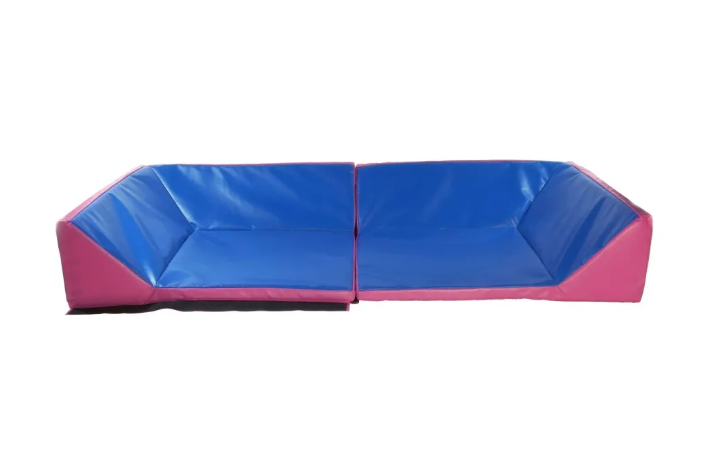 Blue cushioned mat with pink sides, foam core and phthalates free PVC cover, shown as two joined pieces on a white background.