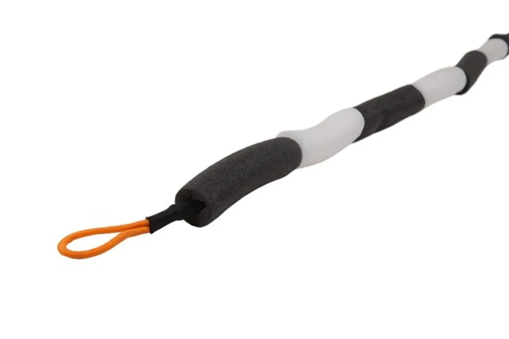 Foam-covered elastic crossbar with alternating dark gray and white foam sections and an orange cord loop at one end.