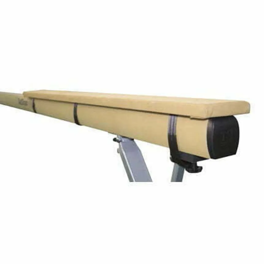 Balance beam widener pad on a gymnastics beam, high-density foam coated with microfiber leather and fastened by hook-and-loop straps.