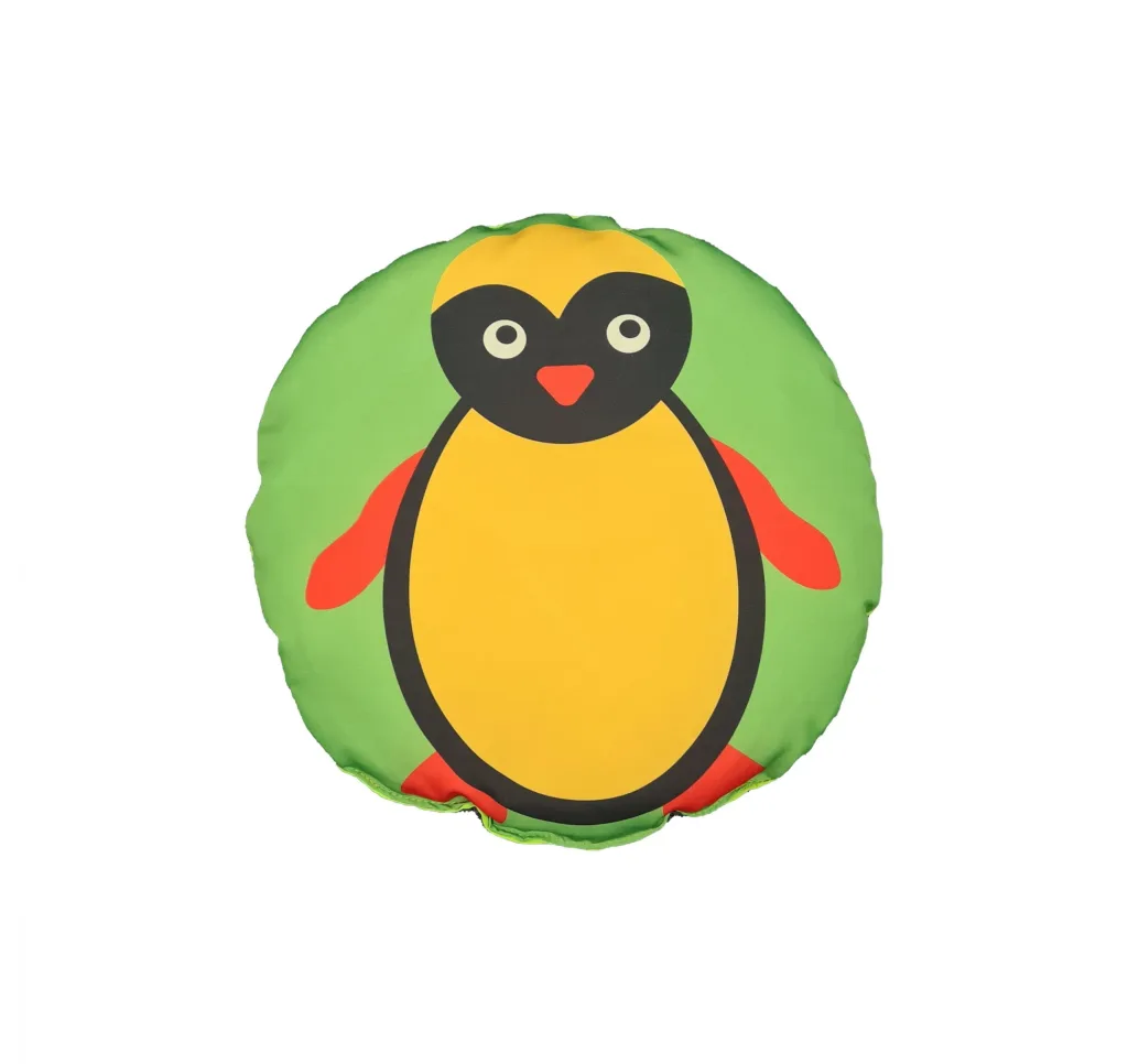 Green round fibre-filled child scatter cushion with a yellow-bodied, black-faced penguin graphic and red flippers and feet.