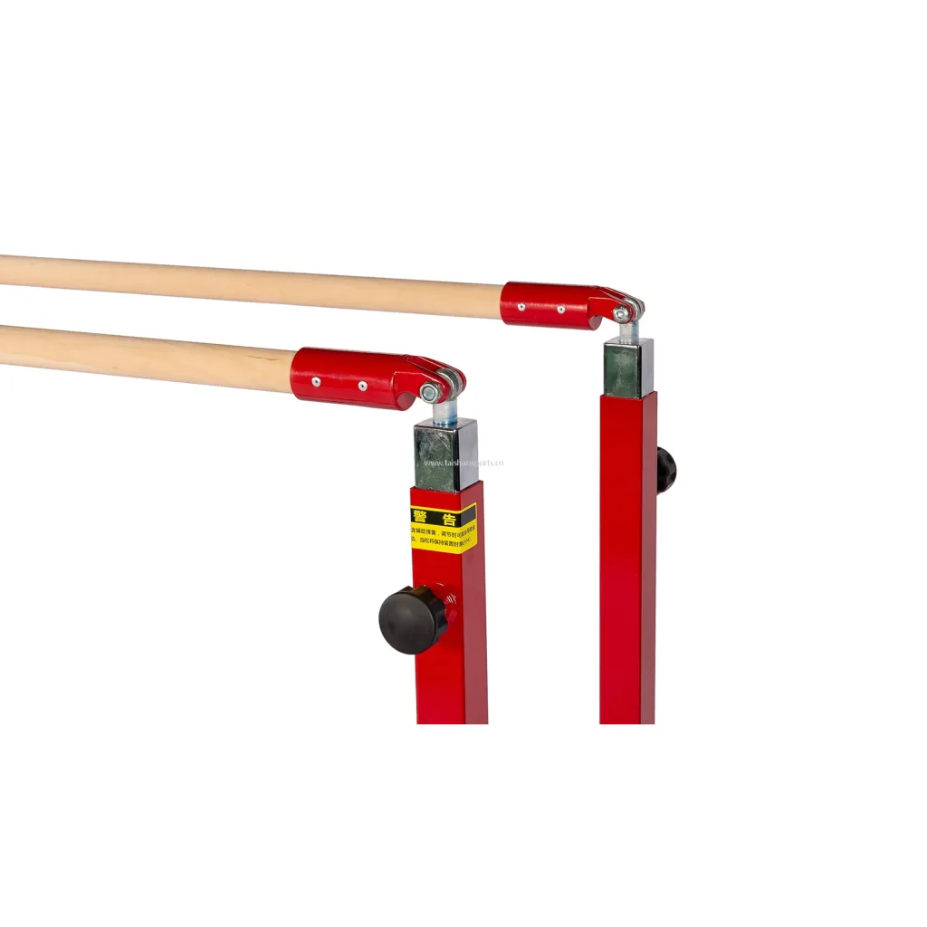 Children's parallel bars with maple-wrapped fiberglass rails mounted on red carbon steel adjustable uprights with black adjustment knobs.