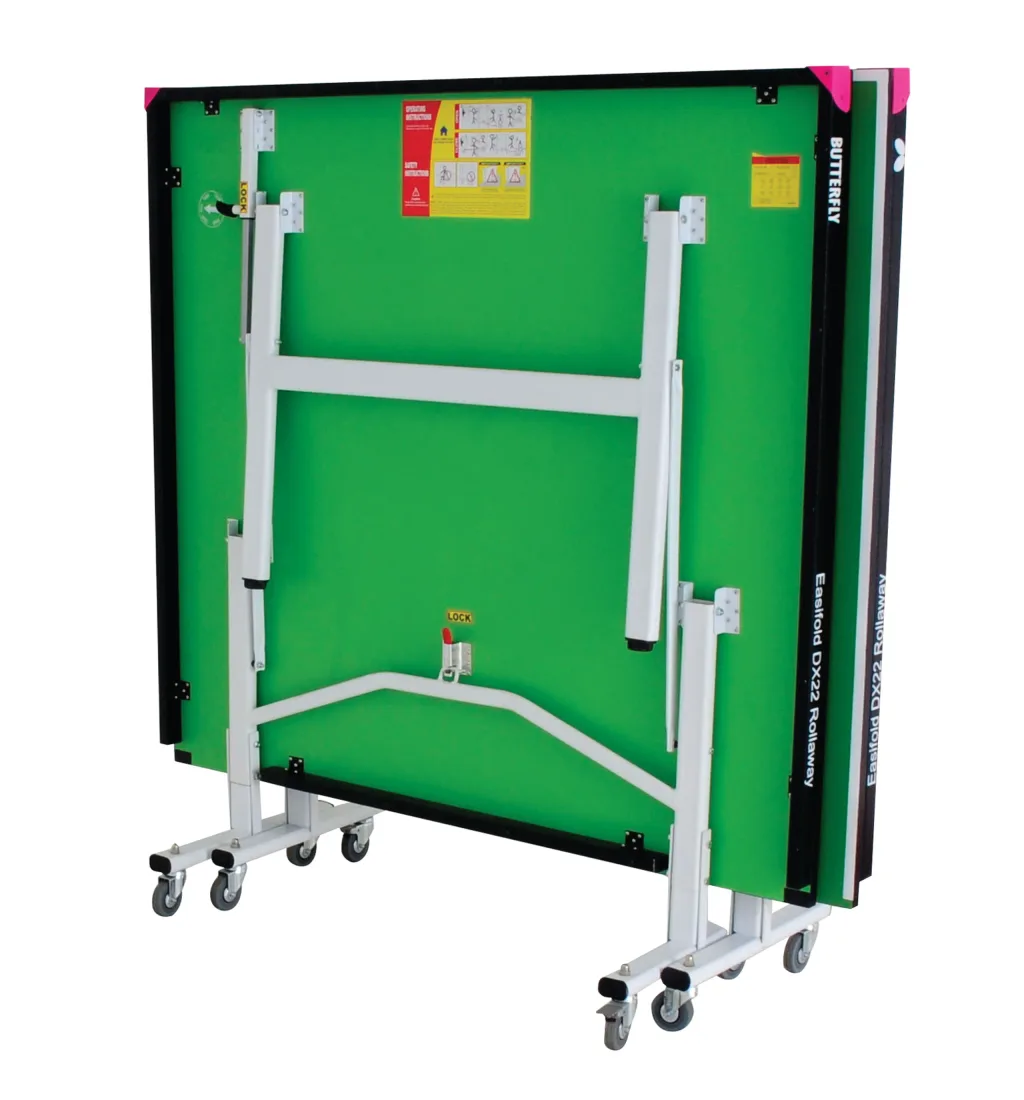 Folded green table tennis top on light silver steel legs and undercarriage with wheels, magenta corner pieces and a visible LOCK label.