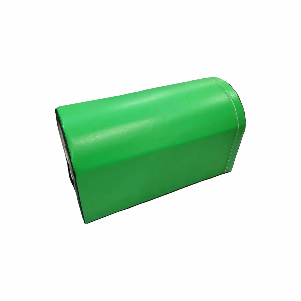 Green mailbox-shaped gymnastics trainer with curved top and black ends, carry handles, high-density PU foam core with flame-retardant PVC cover.