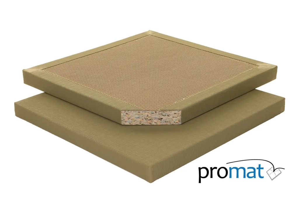 Stacked contest judo mats with tatami-embossed tops, PVC covers, visible chip-foam core cross-section and waffle-base texture.