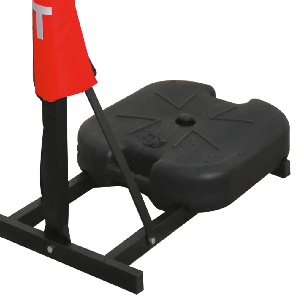 Black plastic removable ballast box and black metal base supporting a netball post with red pole padding showing white letter T.