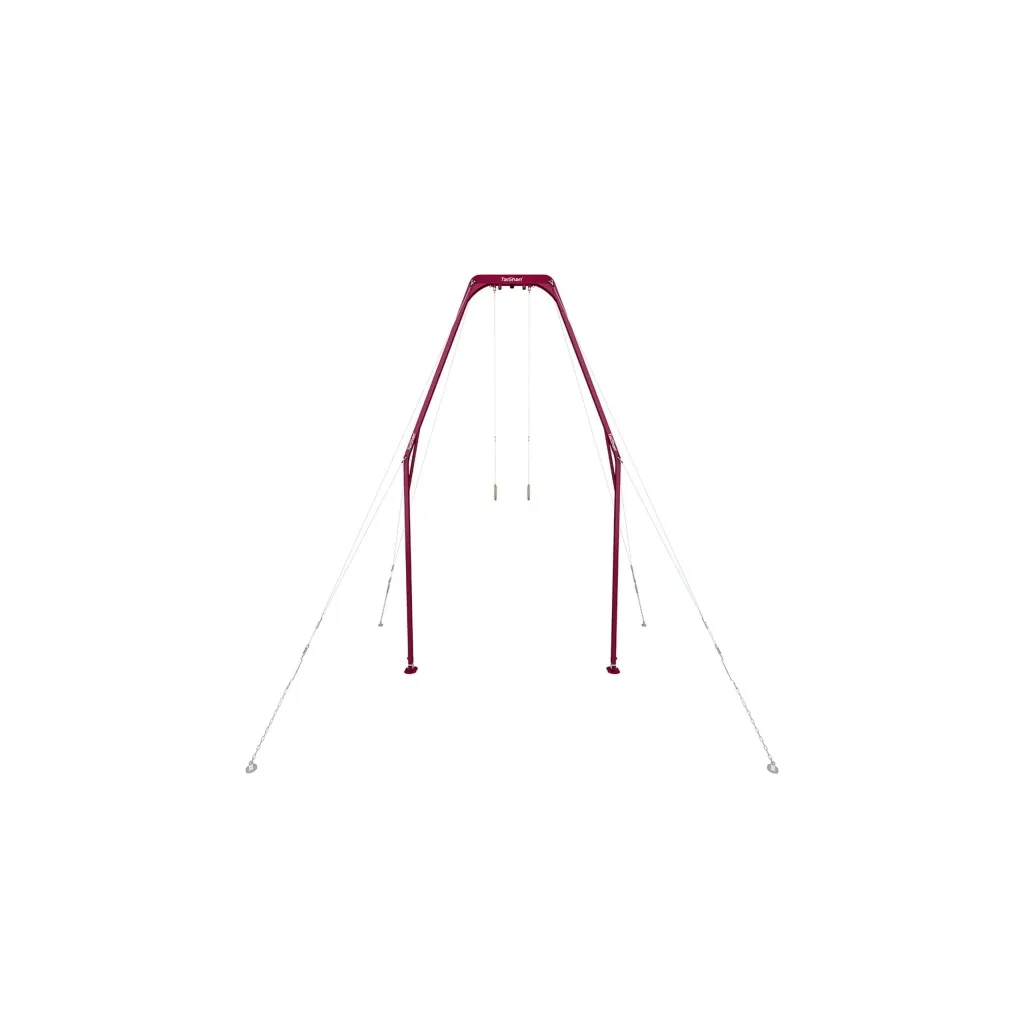 Red competition rings frame with two hanging composite wood rings on thin steel cables and external tensioning support cables anchoring the structure.