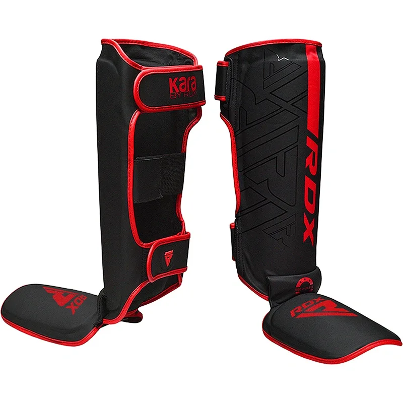 Black and red shin and instep guards with Kara by RDX and RDX text, Velcro straps, and red piping.