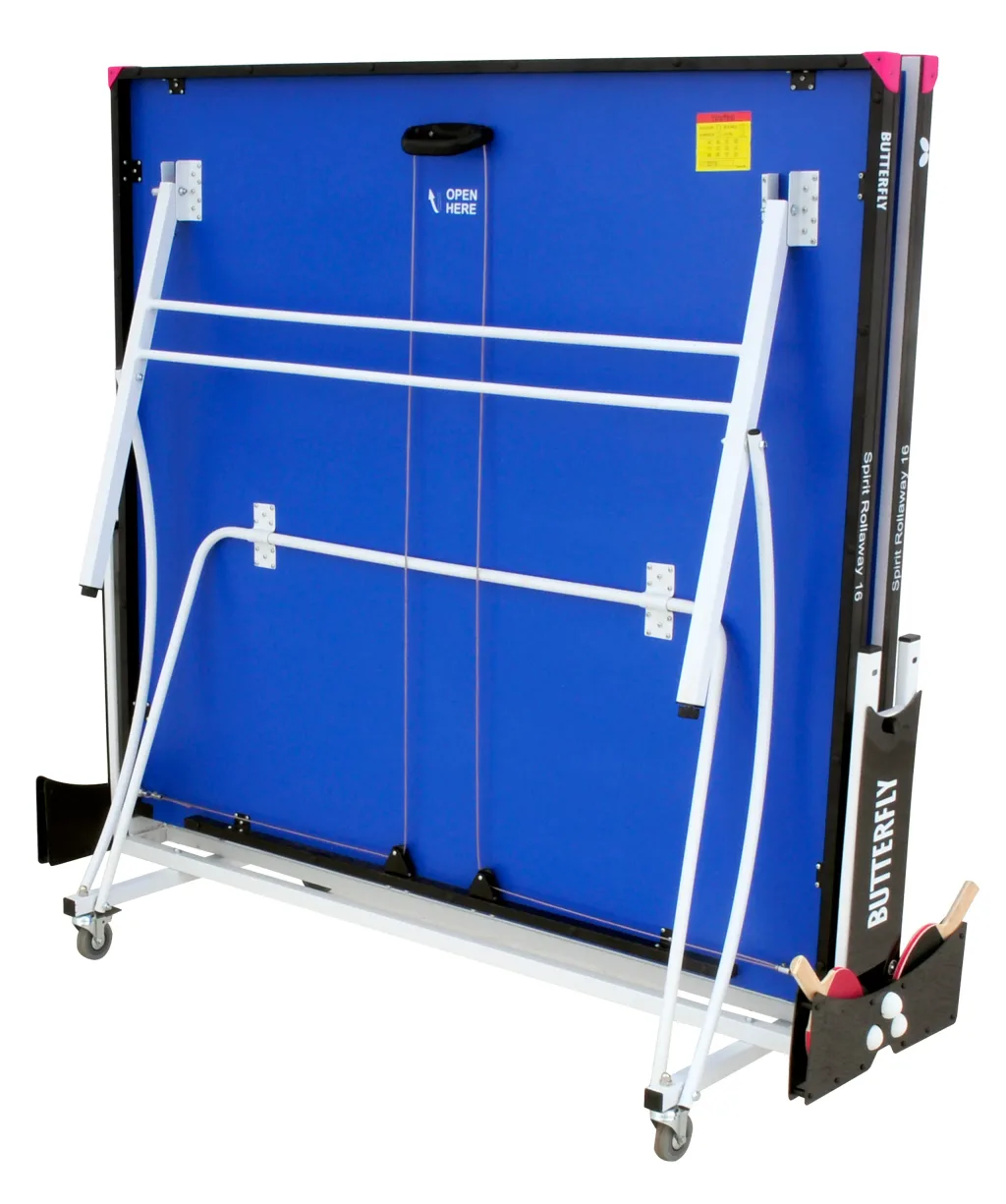 Folded table tennis table with blue top, light silver legs, magenta corners, two red bats and three balls in holder, handle reading OPEN HERE.