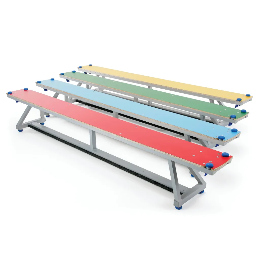 Lita benches with aluminium frames, coloured timber or upholstered tops in four colours and rubber feet, arranged in staggered rows.