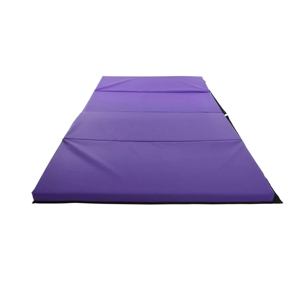 Purple four-way folding mat with a heavy duty PVC cover, visible black base edge and carry handles.