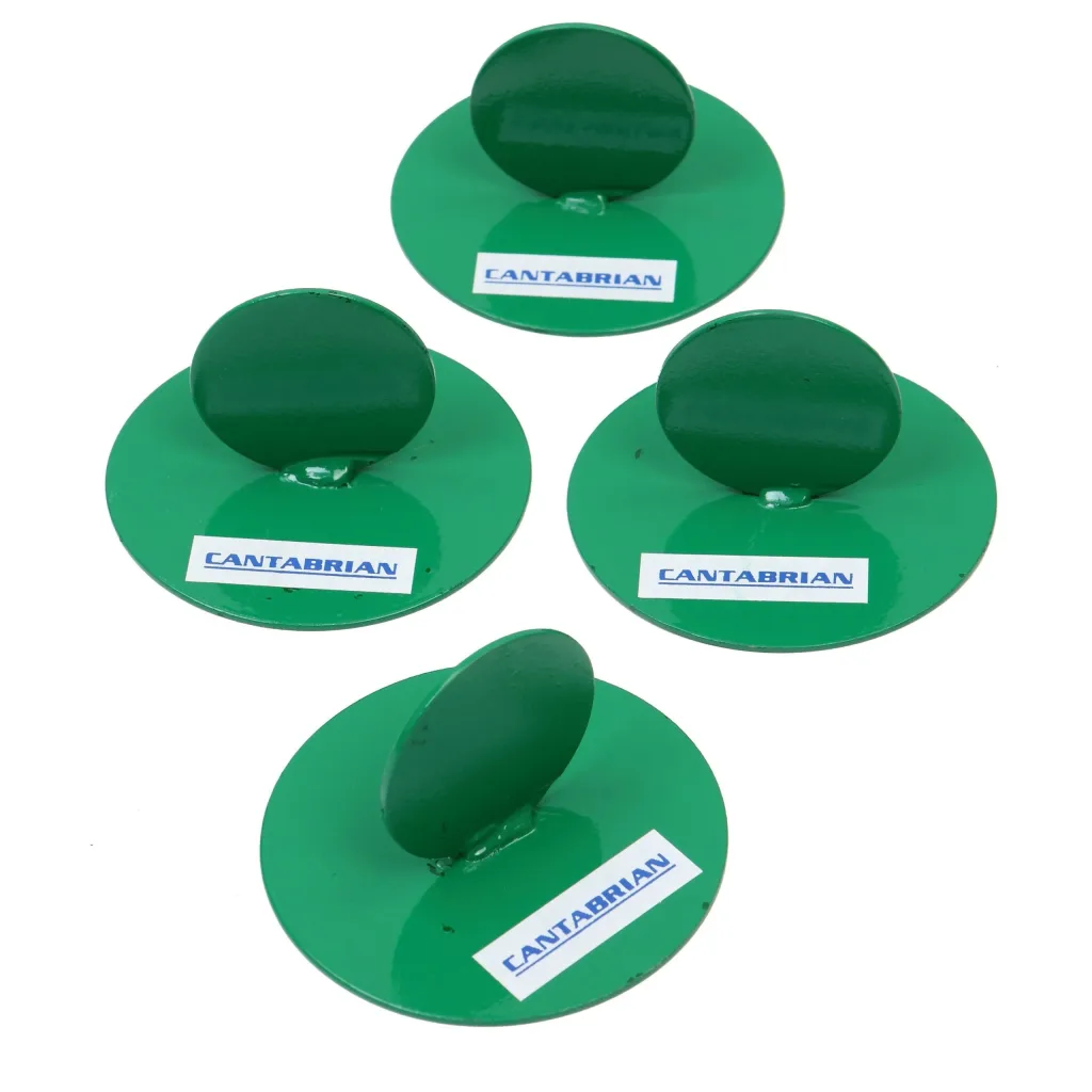 Four green metal runway markers made from two welded round sheets, each with an upright oval tab and a white sticker reading CANTABRIAN.