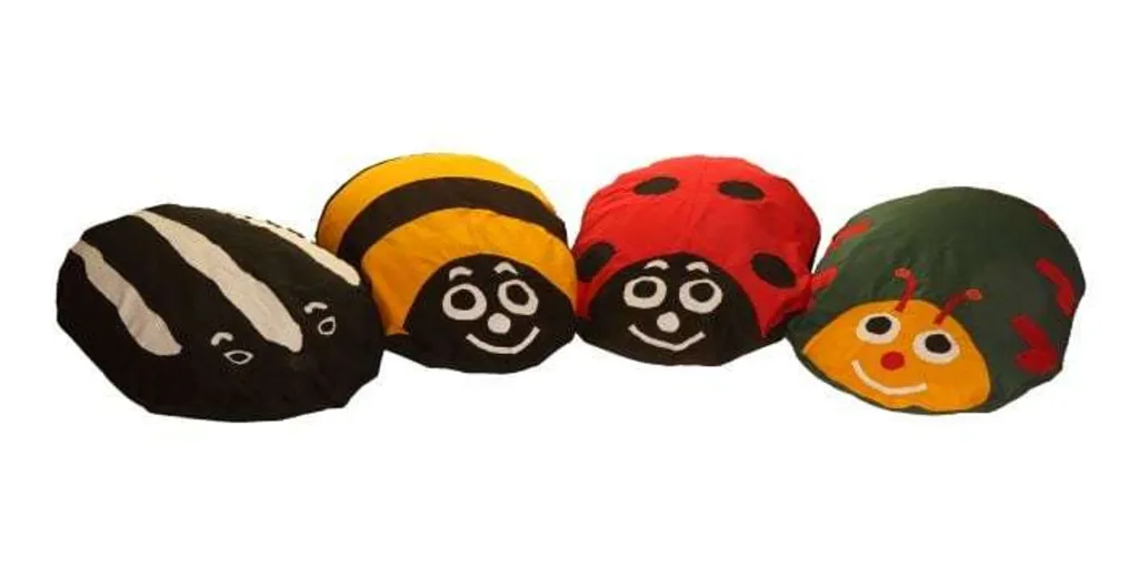 Four large animal floor cushions with smiling faces in bug and striped designs, fibre filled with removable liners and machine-washable covers.